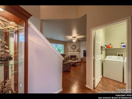 Fireplace, Interior, Washer, Wood Texture Flooring