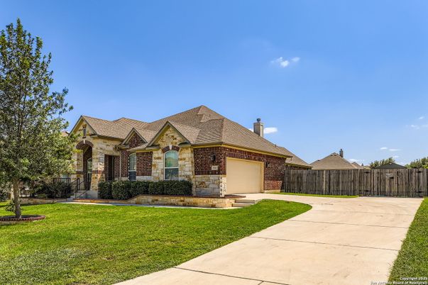 Attached, Backyard, Exterior, Facade, Brick Facade, French Provincial