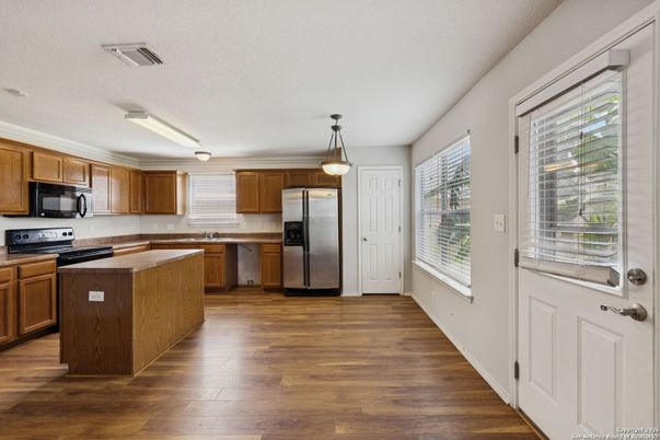 Interior, Kitchen, Pendant Lights, Stainless Steel Appliances, Wood Texture Flooring