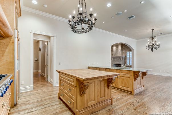 Chandelier, Fireplace, Interior, Recessed Lighting, Wood Texture Flooring