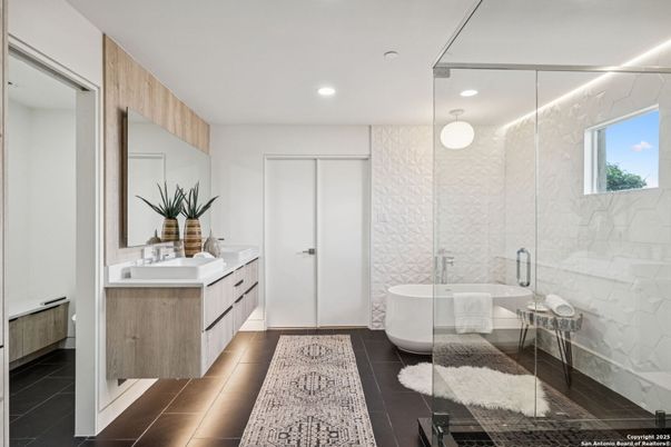 Bathroom, Dual Sink Vanities, Free Standing Baths, Glass Shower, Interior, Marble Walls, Recessed Lighting