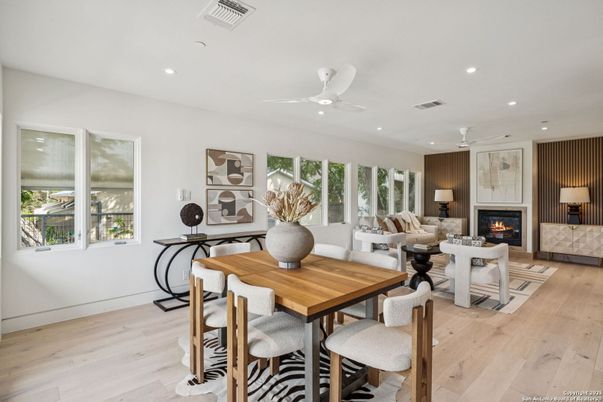 Dining room, Fireplace, Interior, Living room, Recessed Lighting, Wood Texture Flooring