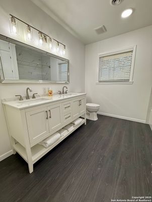 Bathroom, Dual Sink Vanities, Interior, Recessed Lighting, Wood Texture Flooring