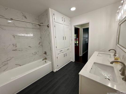 Bathroom, Dual Sink Vanities, Interior, Marble Walls, Recessed Lighting