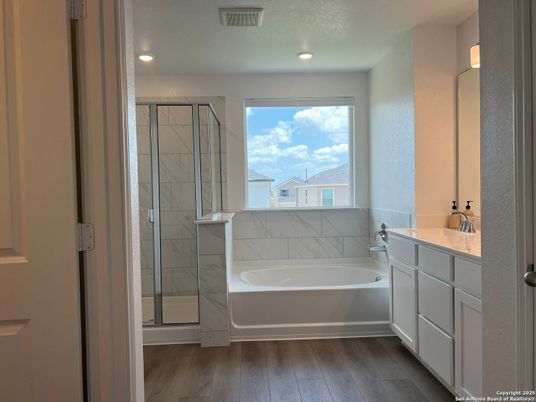 Bathroom, Glass Shower, Interior, Marble Walls, Recessed Lighting, Wood Texture Flooring
