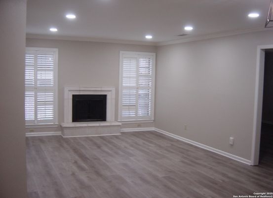 Empty room, Fireplace, Interior, Recessed Lighting, Wood Texture Flooring