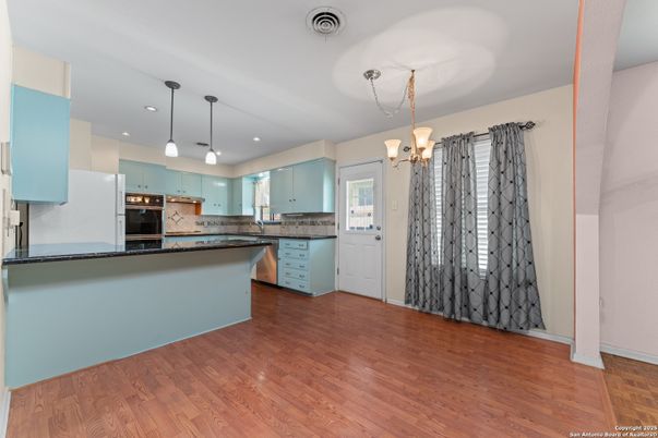 Interior, Kitchen, Pendant Lights, Recessed Lighting, Stainless Steel Appliances, Wood Texture Flooring