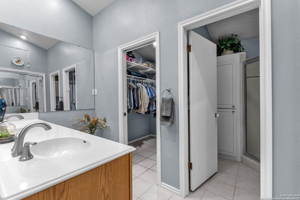 Bathroom, Dual Sink Vanities, Interior, Recessed Lighting, Walk-in Closets