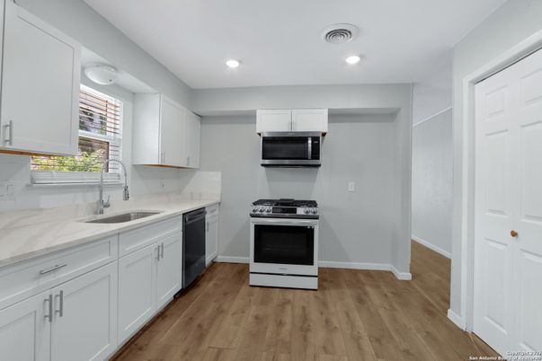Interior, Kitchen, Recessed Lighting, Stainless Steel Appliances, Wood Texture Flooring