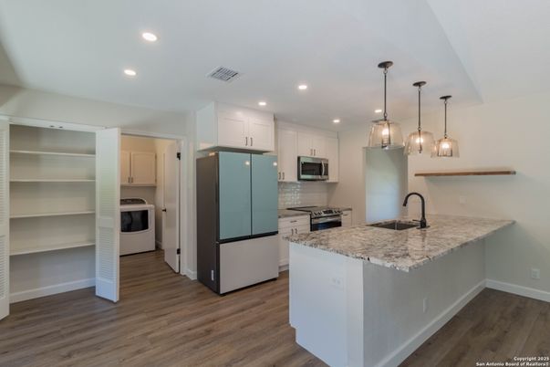 Interior, Kitchen, Pendant Lights, Recessed Lighting, Stainless Steel Appliances, Wood Texture Flooring