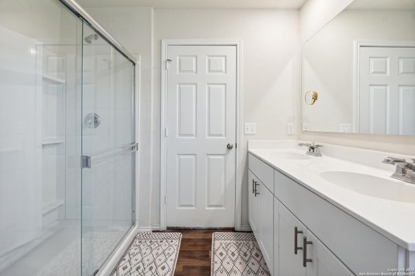 Bathroom, Dual Sink Vanities, Glass Shower, Interior, Wood Texture Flooring