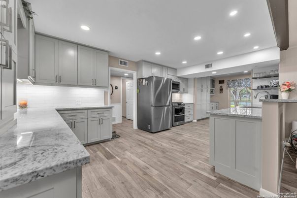 Interior, Kitchen, Recessed Lighting, Stainless Steel Appliances, Wood Texture Flooring