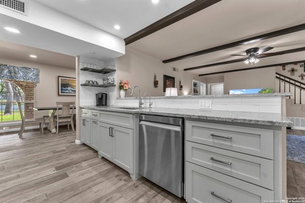 Dining room, Interior, Kitchen, Recessed Lighting, Stainless Steel Appliances, Wood Texture Flooring