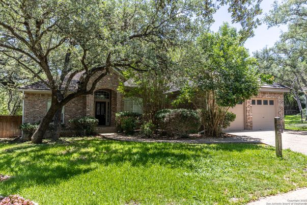 Attached, Backyard, Exterior, Facade, Brick Facade, Tudor Revival
