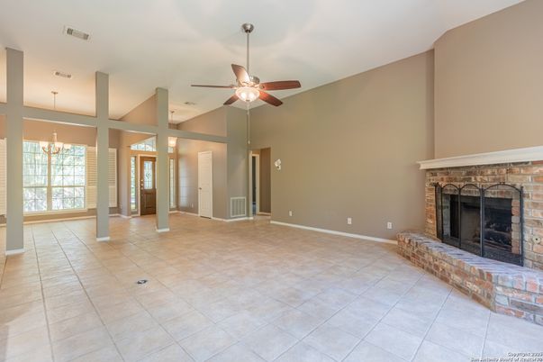 Chandelier, Empty room, Fireplace, Interior