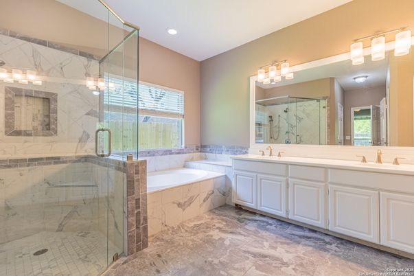 Bathroom, Dual Sink Vanities, Glass Shower, Interior, Marble Walls, Recessed Lighting