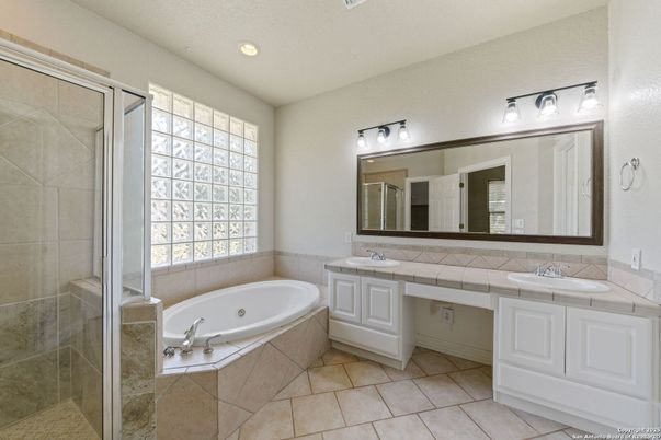 Bathroom, Dual Sink Vanities, Interior, Recessed Lighting, Tile Countertops