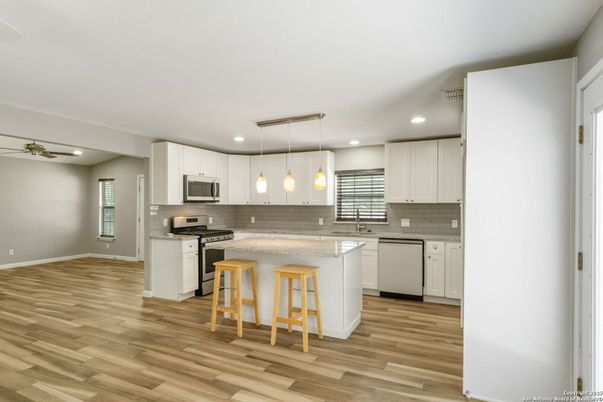 Interior, Kitchen, Pendant Lights, Recessed Lighting, Stainless Steel Appliances, Wood Texture Flooring