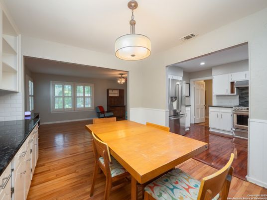 Dining room, Interior, Kitchen, Recessed Lighting, Stainless Steel Appliances, Wood Texture Flooring