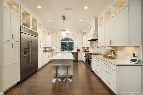 Chandelier, Interior, Kitchen, Pendant Lights, Recessed Lighting, Stainless Steel Appliances, Wood Texture Flooring