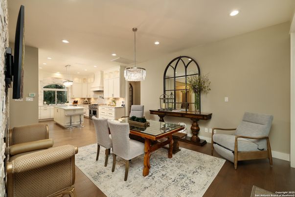 Chandelier, Dining room, Interior, Kitchen, Pendant Lights, Recessed Lighting, Stainless Steel Appliances, Wood Texture Flooring