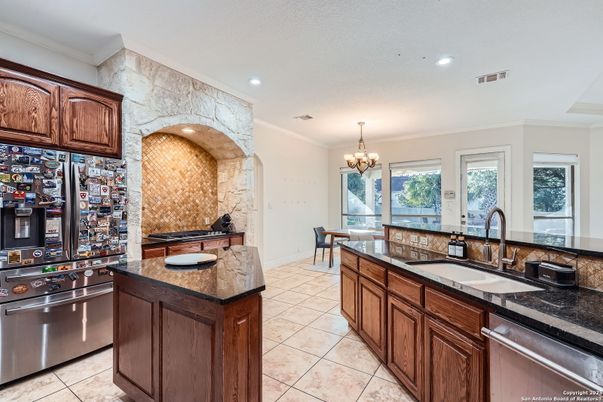Chandelier, Dining room, Interior, Kitchen, Recessed Lighting, Stainless Steel Appliances