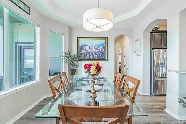 Dining room, Interior, Pendant Lights, Stainless Steel Appliances, Wood Texture Flooring