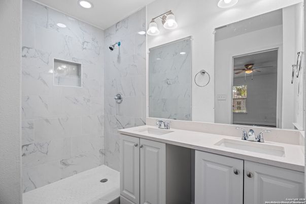 Bathroom, Dual Sink Vanities, Interior, Marble Walls, Recessed Lighting