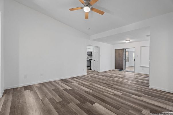 Empty room, Interior, Kitchen, Stainless Steel Appliances, Wood Texture Flooring