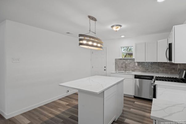 Interior, Kitchen, Pendant Lights, Recessed Lighting, Stainless Steel Appliances, Wood Texture Flooring