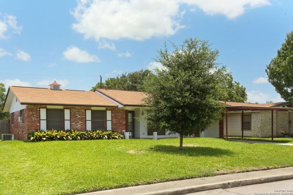 Attached, Backyard, Exterior, Facade, Brick Facade, Ranch
