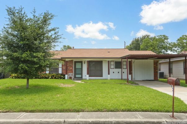 Attached, Backyard, Exterior, Facade, Brick Facade, Ranch
