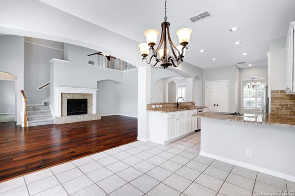 Chandelier, Fireplace, Interior, Recessed Lighting, Wood Texture Flooring