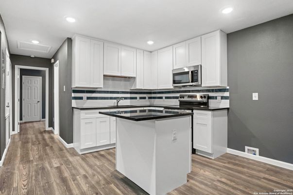 Interior, Kitchen, Recessed Lighting, Stainless Steel Appliances, Wood Texture Flooring