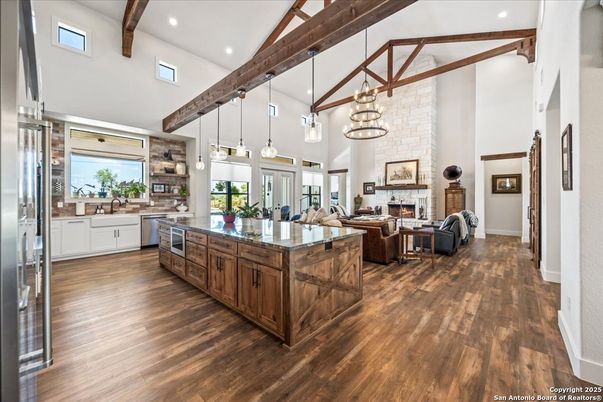 Fireplace, Interior, Kitchen, Living room, Pendant Lights, Recessed Lighting, Stone Walls, Wooden Beams, Wood Texture Flooring