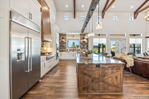 Chandelier, Interior, Kitchen, Living room, Pendant Lights, Recessed Lighting, Stainless Steel Appliances, Wooden Beams, Wood Texture Flooring