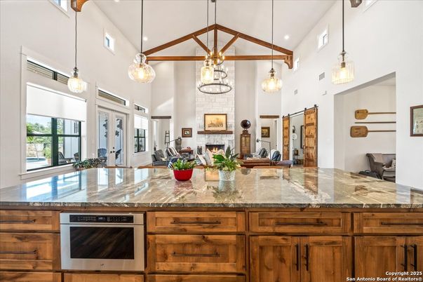 Fireplace, Interior, Kitchen, Pendant Lights, Recessed Lighting, Stainless Steel Appliances