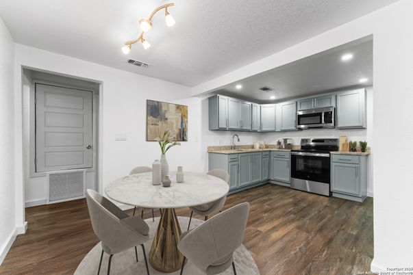Dining room, Interior, Kitchen, Recessed Lighting, Stainless Steel Appliances, Wood Texture Flooring