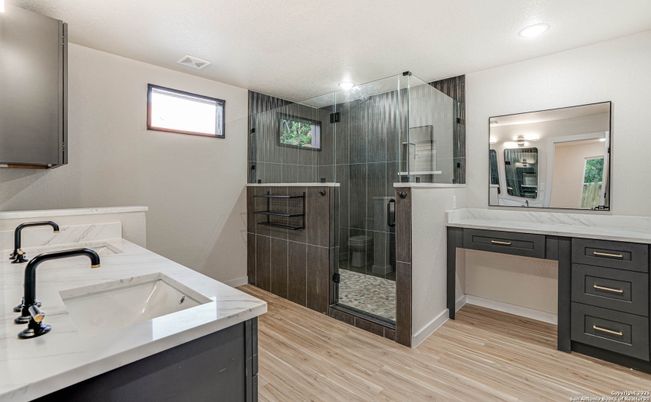 Bathroom, Dual Sink Vanities, Glass Shower, Interior, Recessed Lighting, Wood Texture Flooring