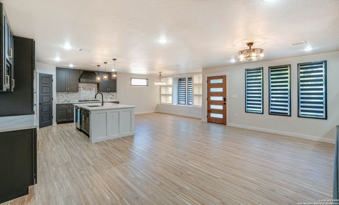 Interior, Kitchen, Marble Walls, Pendant Lights, Recessed Lighting, Wood Texture Flooring