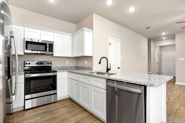 Interior, Kitchen, Recessed Lighting, Stainless Steel Appliances, Wood Texture Flooring