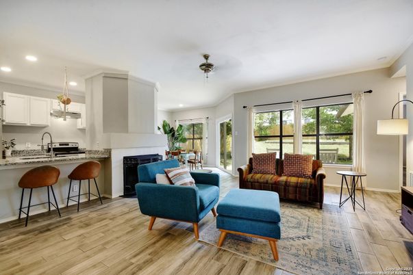 Dining room, Fireplace, Interior, Kitchen, Living room, Recessed Lighting, Wood Texture Flooring