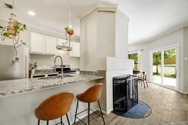 Fireplace, Interior, Kitchen, Pendant Lights, Recessed Lighting, Wood Texture Flooring