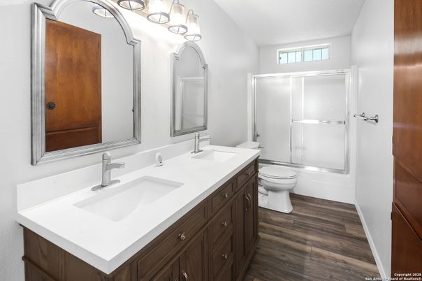 Bathroom, Dual Sink Vanities, Glass Shower, Interior, Wood Texture Flooring