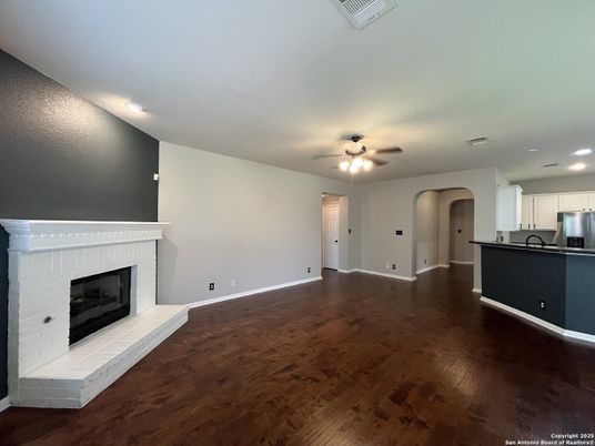 Empty room, Fireplace, Interior, Kitchen, Recessed Lighting, Wood Texture Flooring