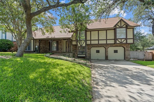 Attached, Exterior, Facade, Brick Facade, Tudor Revival