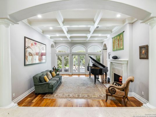 Fireplace, Interior, Living room, Piano, Recessed Lighting, Wood Texture Flooring