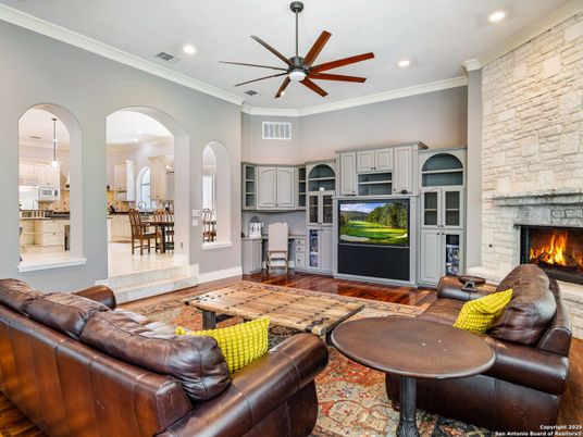 Dining room, Fireplace, Interior, Kitchen, Living room, Recessed Lighting, Stone Walls, Wood Texture Flooring