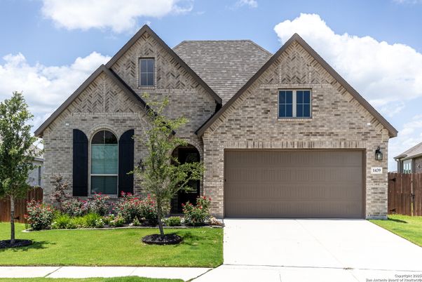 Attached, Exterior, Facade, Brick Traditional