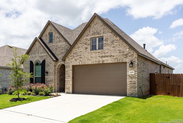 Attached, Exterior, Facade, Brick Traditional